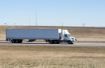 Heavy Cargo on the Road. A truck hauling freight along a highway