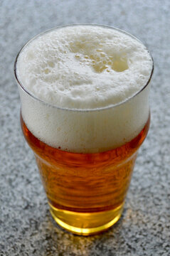 A pint of beer on the table