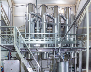 Technological equipment in modern dairy facilities.Production of dairy products. Plant, factory in...