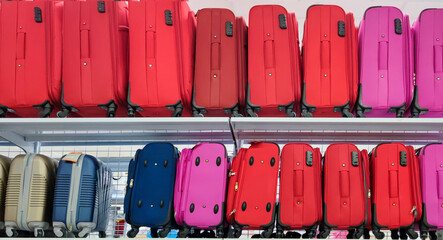 Set of colored suitcases for travel and vacation.