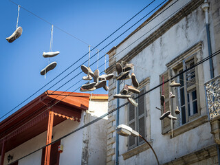Fototapeta na wymiar Shoe tossing in Limassol Old town, Cyprus