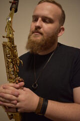 Portrait of a man with a saxophone