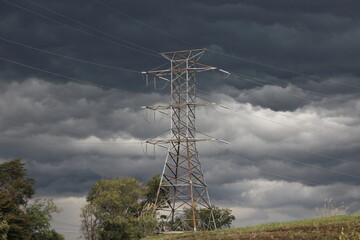 power lines with cloudy sky