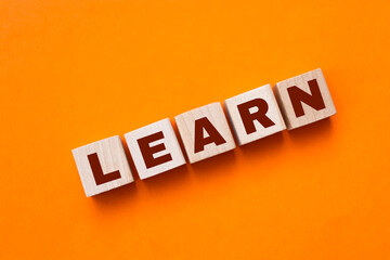 Obraz premium Word learn made with wood building blocks, stock image