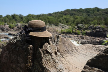 hat on the rocks