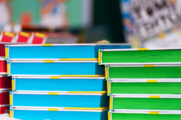 Stack of new books on the table.