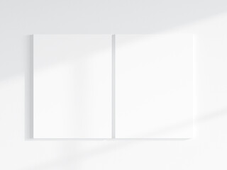 two vertical canvases mockup on the wall