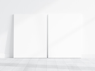 two vertical canvases mockup on the floor