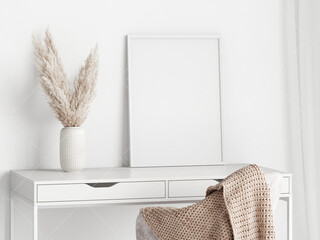 work space interior wall mockup with pampas and white frame