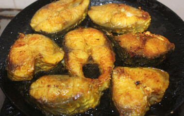 Rohu fish getting shallow fried