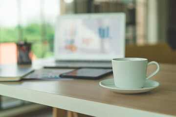 white coffee cup on working table