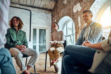 Group of employees on a lesson on team building.