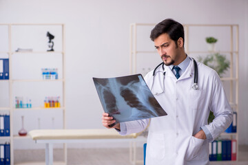 Young male doctor radiologist working in the clinic