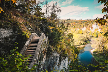 Autumnal view of the Devil's Bridge near Inzigkofen, Germany. The Danube river is floating in the valley on the right side.