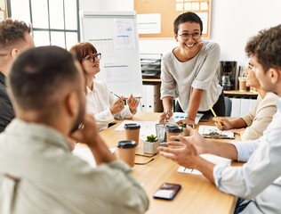 Group of business workers listening boss conference during meeting at the office.