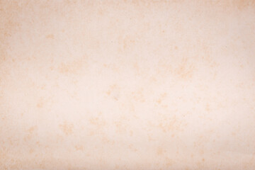The texture of the decades old light yellow paper.