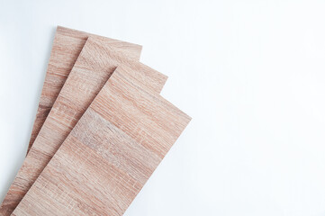 Three furniture wooden detail in sonoma oak color on white background.