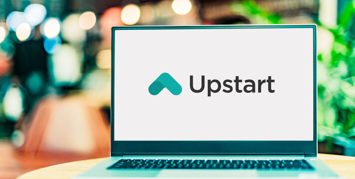 Laptop computer displaying logo of Upstart