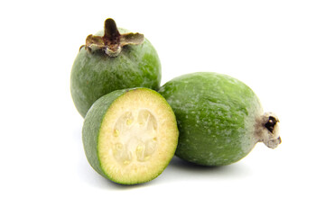 Feijoa fruit or whole and half pineapple guava isolated on white