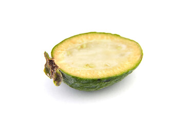 Half of feijoa fruit or pineapple guava isolated on white