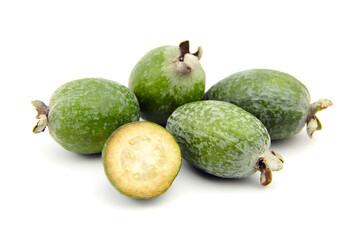Feijoa fruit or whole and half pineapple guava isolated on white
