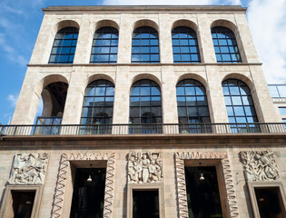 Obraz premium Arengario Palace seat of the 900 museum in Duomo square.Milan, Italy.