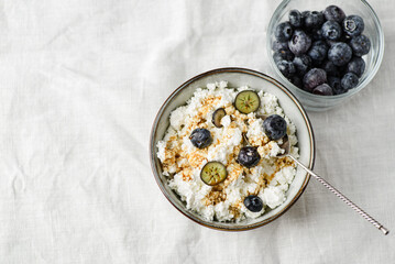 cottage cheese with blueberries on table