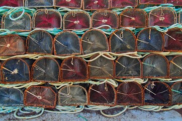 Seafood traps stacked in the harbour. fishing industry.