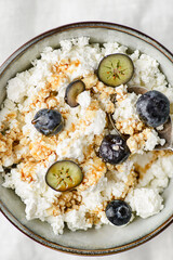 cottage cheese with blueberries on table