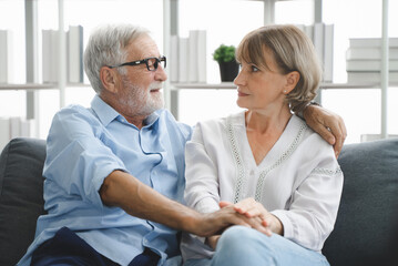 Obraz premium A simple day of a retired couple. Mature couple sitting in the living room