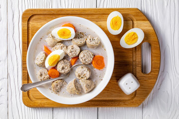 Zurek polish rye soup on a white wooden background