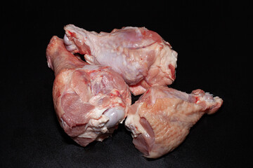 Turkey drumsticks with skin. Organic turkey meat with greens