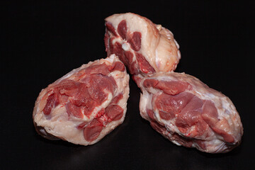 Pieces of turkey with bacon. Organic turkey meat with greens