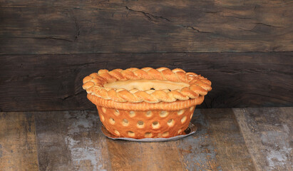 bread basket with bread on wooden background