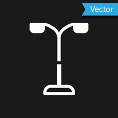 White Street light system icon isolated on black background. Vector