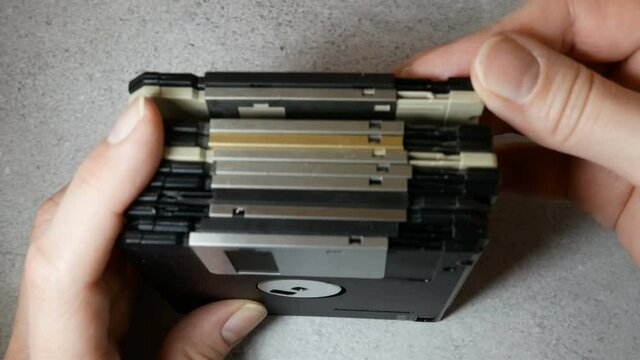 Top secret information on retro vintage floppy disk magnetic computer, concept, closeup