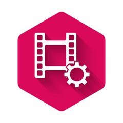 White Play Video icon isolated with long shadow. Film strip sign. Pink hexagon button. Vector