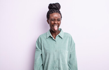 black pretty woman with cheerful, carefree, rebellious attitude, joking and sticking tongue out,...