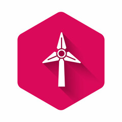 White Wind turbine icon isolated with long shadow. Wind generator sign. Windmill for electric power production. Pink hexagon button. Vector