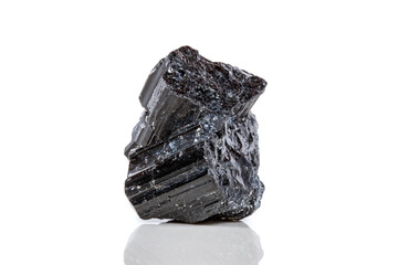 macro mineral stone sherle, schorl, black tourmaline on white background