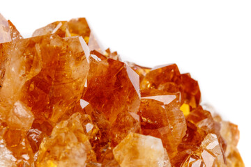 Macro mineral stone Citrine in rock in crystals on a white background