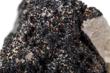 Macro mineral stone Schorl, Black Tourmaline on a white background