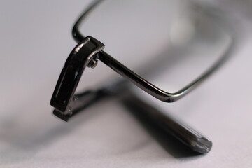 The frame of the glasses was taken on a macro on the table.