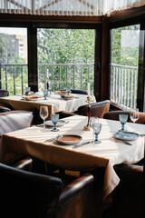 A beautifully laid table with exquisite dishes in a modern restaurant.