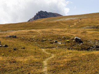 Panoramic views of the mountains from hiking trails in the mountainous area on a warm, sunny autumn day, walking and communicating with nature.