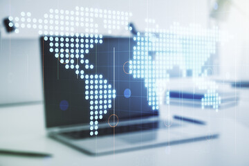 Multi exposure of abstract creative digital world map on laptop background, research and analytics concept