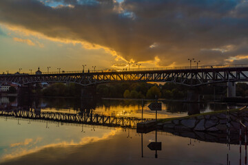 Sunset in Roudnice nad Labem town with old church and towers with Labe river