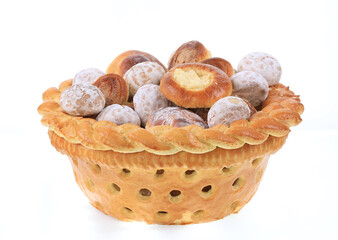 bread basket with sweet buns isolated on white background