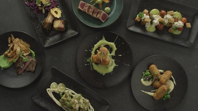 Fine dining restaurant. Chef prepares meal. Top down shot. 4k. Red weapon