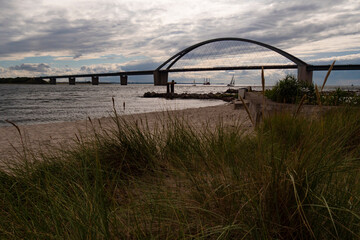 Sandy beach with Fehmarn Sund bridge in the background